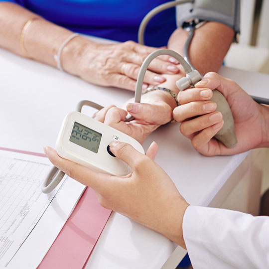 checking blood pressure